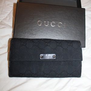 Gucci monogram leather wallet vintage